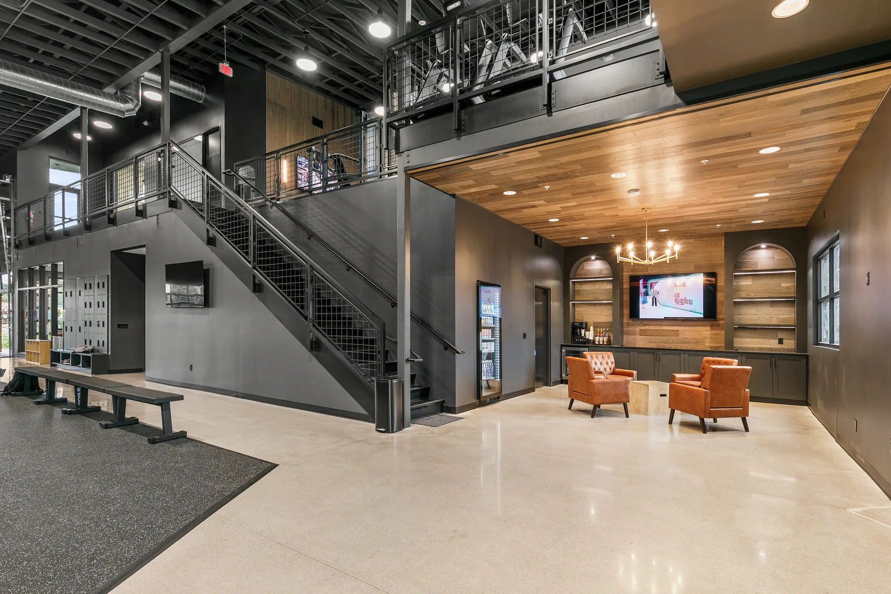 Johnston Athletic interior with exposed structure and detailed wood ceilings